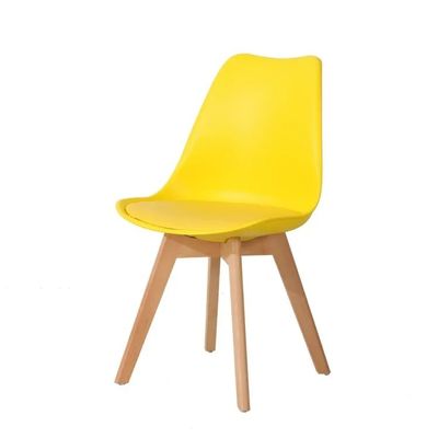 kopen Gele gepoleerde leer eetstoelen PP kunststof moderne eetstoelen met houten benen online vervaardiging
